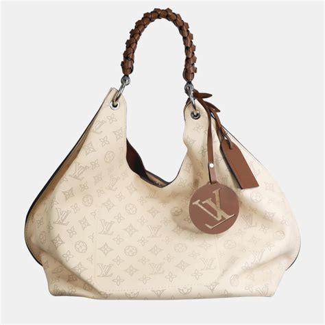 louis vuitton cream bag|louis vuitton mahina hobo bag.